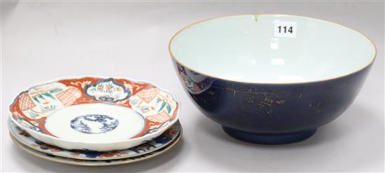 A Chinese gilt decorated powder blue bowl and two Chinese Imari plates, 18th century and a Japanese Imari plate Bowl diameter 26cm